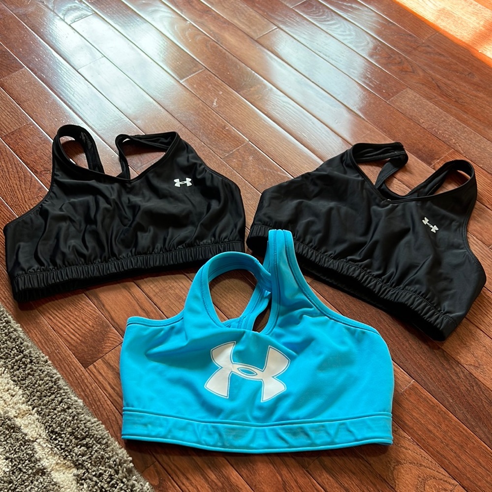 Lot of 3 Under Armour sports bras size medium.